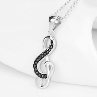 Silver G-Clef Necklace With Black Inlays