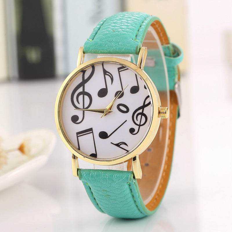 Gold-Colored Music Note Watch