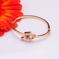 Rose Gold-Plated Crystal Note Bracelet