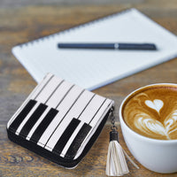 Compact Keyboard Wallet With Tassel