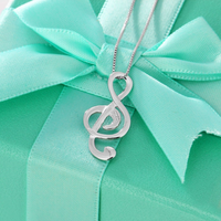 Polished Silver G-Clef Necklace